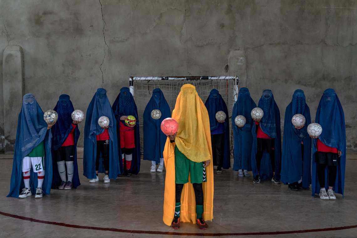 FILE - An Afghan women's soccer team poses for a photo in Kabul, Afghanistan, Thursday, Sept. 22, 2022. The Taliban must embrace and uphold human rights obligations in Afghanistan, the U.N. mission in the country said Sunday, Dec. 10, 2023, on Human Rights Day and the 75th anniversary of the Universal Declaration of Human Rights. Since seizing power in 2021, the Taliban have erased basic rights and freedoms, with women and girls deeply affected. They are excluded from most public spaces and daily life, and the restrictions have sparked global condemnation. (AP Photo/Ebrahim Noroozi, File) FILE - An Afghan women's soccer team poses for a photo in Kabul, Afghanistan, Thursday, Sept. 22, 2022. The Taliban must embrace and uphold human rights obligations in Afghanistan, the U.N. mission in the country said Sunday, Dec. 10, 2023, on Human Rights Day and the 75th anniversary of the Universal Declaration of Human Rights. Since seizing power in 2021, the Taliban have erased basic rights and freedoms, with women and girls deeply affected. They are excluded from most public spaces and daily life, and the restrictions have sparked global condemnation. (AP Photo/Ebrahim Noroozi, File)