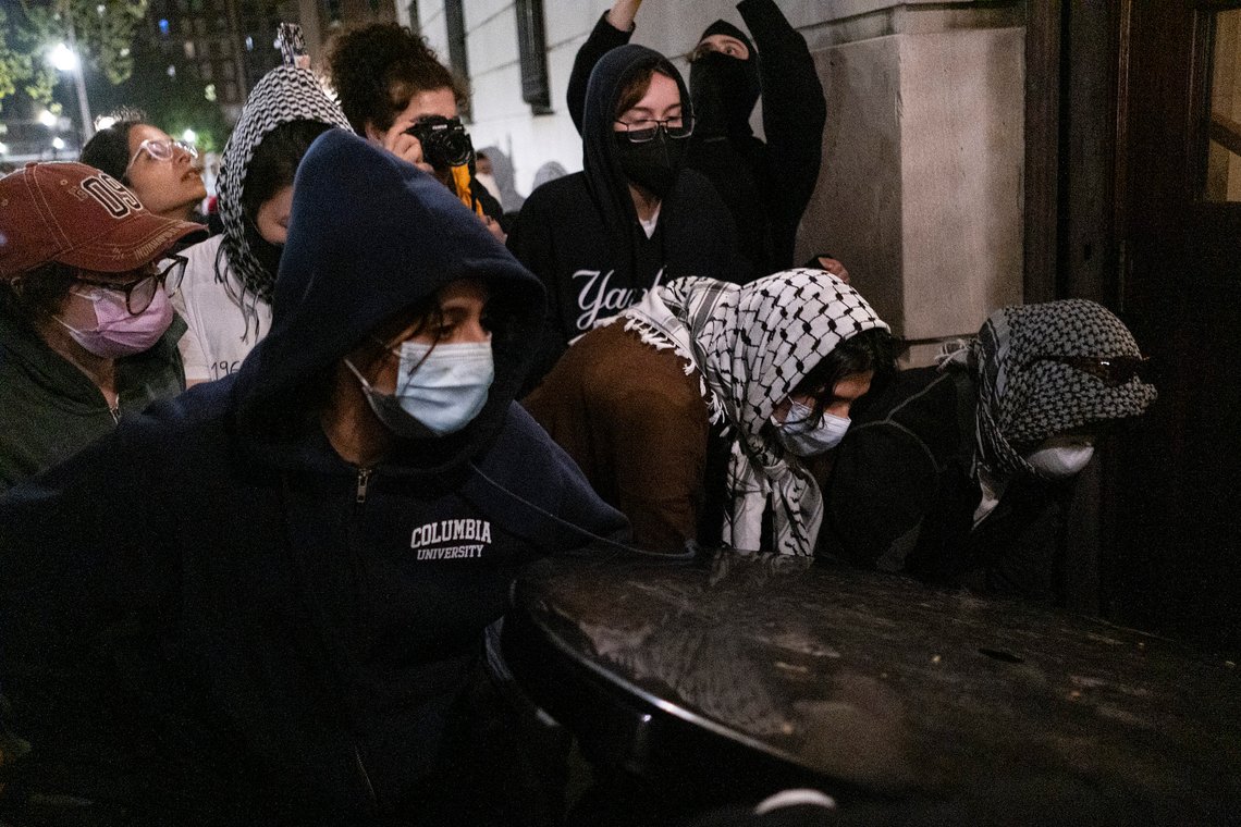 Students with the Gaza Solidarity Encampment block the entrance of Hamilton Hall at Columbia University after taking over it on Tuesday, April 30, 2024 in New York. Columbia Students for Justice in Palestine called for mobilization close to midnight. Students have been occupying part of campus since April 17, calling for the university to divest from institutions that have ties to Israel. (Marco Postigo Storel via AP) Students with the Gaza Solidarity Encampment block the entrance of Hamilton Hall at Columbia University after taking over it on Tuesday, April 30, 2024 in New York. Columbia Students for Justice in Palestine called for mobilization close to midnight. Students have been occupying part of campus since April 17, calling for the university to divest from institutions that have ties to Israel. (Marco Postigo Storel via AP)