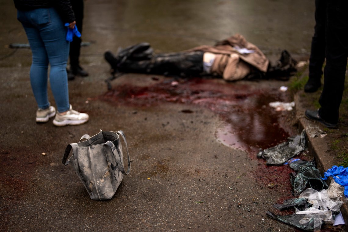 The body of a killed woman lies on the ground after a Russian bombardment in Chernihiv, Ukraine, Wednesday, April 17, 2024. Three Russian missiles slammed into a downtown area of the northern Ukrainian city of Chernihiv on Wednesday, hitting an eight-floor apartment building and killing at least 14 people, authorities said. (AP Photo/Francisco Seco) The body of a killed woman lies on the ground after a Russian bombardment in Chernihiv, Ukraine, Wednesday, April 17, 2024. Three Russian missiles slammed into a downtown area of the northern Ukrainian city of Chernihiv on Wednesday, hitting an eight-floor apartment building and killing at least 14 people, authorities said. (AP Photo/Francisco Seco)