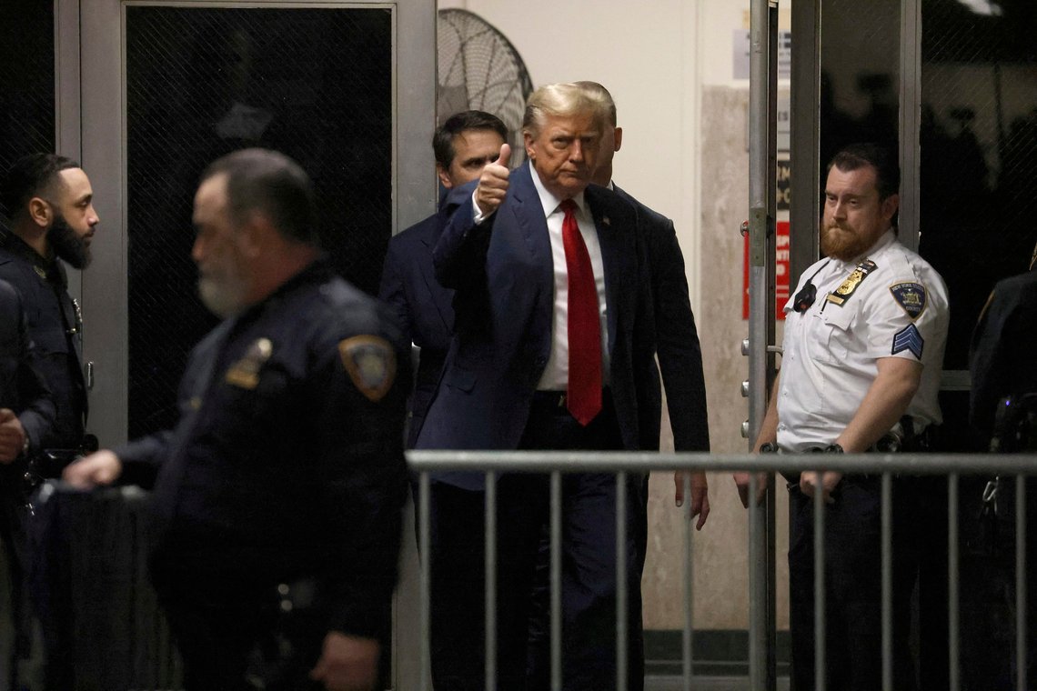 Republican presidential candidate Donald Trump gives a thumbs up as he returns to State Supreme Court in Manhattan after the lunch break on Monday, April 15, 2024, for the first day of his trial on charges of falsifying business records. (Jefferson Siegel/The New York Times via AP, Pool) Republican presidential candidate Donald Trump gives a thumbs up as he returns to State Supreme Court in Manhattan after the lunch break on Monday, April 15, 2024, for the first day of his trial on charges of falsifying business records. (Jefferson Siegel/The New York Times via AP, Pool)