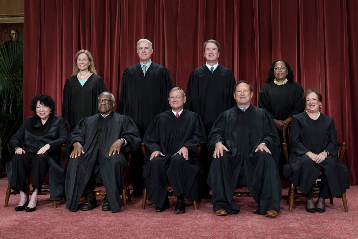 FILE - Members of the Supreme Court sit for a new group portrait following the addition of Associate Justice Ketanji Brown Jackson, at the Supreme Court building in Washington, on Oct. 7, 2022. Bottom row, from left, Associate Justice Sonia Sotomayor, Associate Justice Clarence Thomas, Chief Justice of the United States John Roberts, Associate Justice Samuel Alito, and Associate Justice Elena Kagan. Top row, from left, Associate Justice Amy Coney Barrett, Associate Justice Neil Gorsuch, Associate Justice Brett Kavanaugh, and Associate Justice Ketanji Brown Jackson. The core issue being debated before the Supreme Court on April 25, 2024, boils down to this: Whether a former president is immune from prosecution for actions taken while in office — and, if so, what is the extent of the immunity? (AP Photo/J. Scott Applewhite) FILE - Members of the Supreme Court sit for a new group portrait following the addition of Associate Justice Ketanji Brown Jackson, at the Supreme Court building in Washington, on Oct. 7, 2022. Bottom row, from left, Associate Justice Sonia Sotomayor, Associate Justice Clarence Thomas, Chief Justice of the United States John Roberts, Associate Justice Samuel Alito, and Associate Justice Elena Kagan. Top row, from left, Associate Justice Amy Coney Barrett, Associate Justice Neil Gorsuch, Associate Justice Brett Kavanaugh, and Associate Justice Ketanji Brown Jackson. The core issue being debated before the Supreme Court on April 25, 2024, boils down to this: Whether a former president is immune from prosecution for actions taken while in office — and, if so, what is the extent of the immunity? (AP Photo/J. Scott Applewhite)