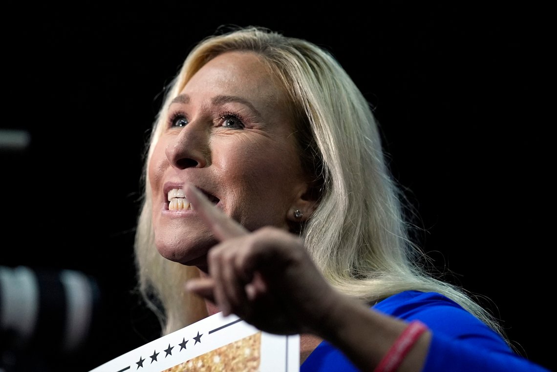 FILE - Rep. Marjorie Taylor Greene, R-Ga., talks at a campaign rally March 9, 2024, in Rome Ga. House Speaker Mike Johnson is at risk of being ousted. Greene filed a “motion to vacate” Friday, March 22, in the middle of a House vote on a $1.2 trillion package to keep the government open. (AP Photo/Mike Stewart, File) FILE - Rep. Marjorie Taylor Greene, R-Ga., talks at a campaign rally March 9, 2024, in Rome Ga. House Speaker Mike Johnson is at risk of being ousted. Greene filed a “motion to vacate” Friday, March 22, in the middle of a House vote on a $1.2 trillion package to keep the government open. (AP Photo/Mike Stewart, File)