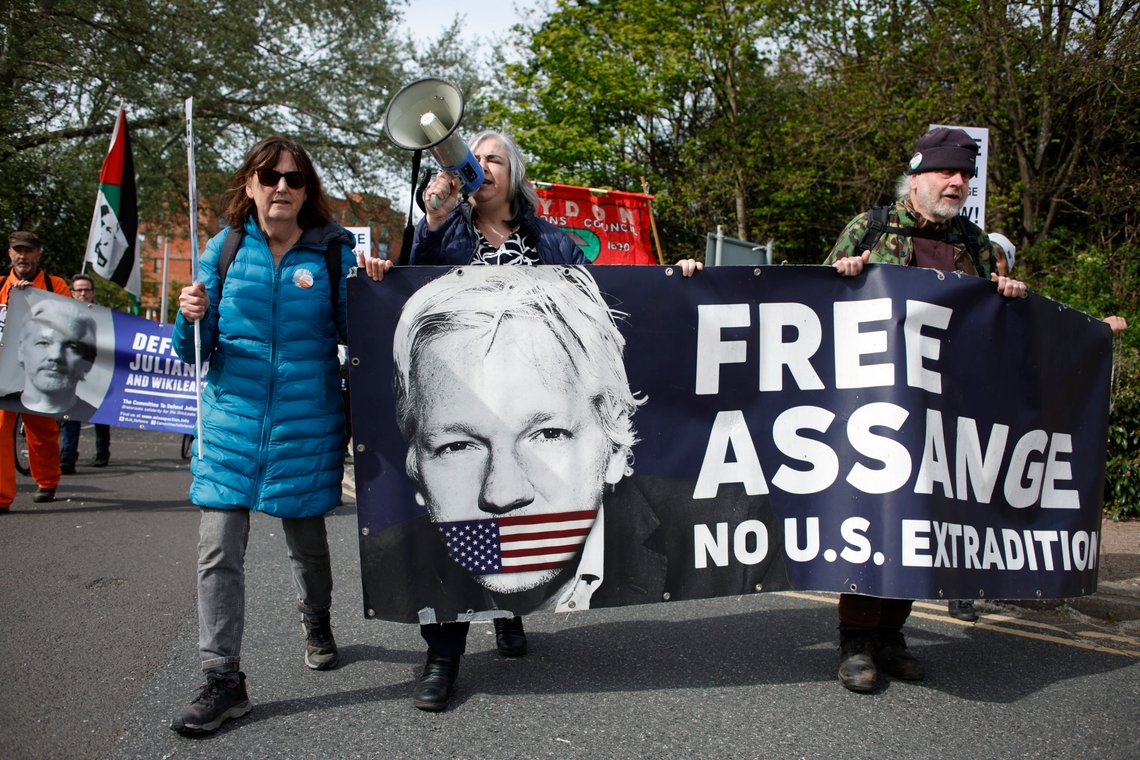 Activists marking five years since the arrest of Wikileaks founder Julian Assange demonstrate outside Belmarsh Prison in London, Sunday, April 14, 2024. U.S. President Joe Biden said last week that he is considering a request from Australia to drop the decade-long U.S. push to prosecute Assange for publishing a trove of American classified documents. Assange is currently fighting extradition to the U.S. from Belmarsh, where he is being held. (AP Photo/David Cliff) Activists marking five years since the arrest of Wikileaks founder Julian Assange demonstrate outside Belmarsh Prison in London, Sunday, April 14, 2024. U.S. President Joe Biden said last week that he is considering a request from Australia to drop the decade-long U.S. push to prosecute Assange for publishing a trove of American classified documents. Assange is currently fighting extradition to the U.S. from Belmarsh, where he is being held. (AP Photo/David Cliff)