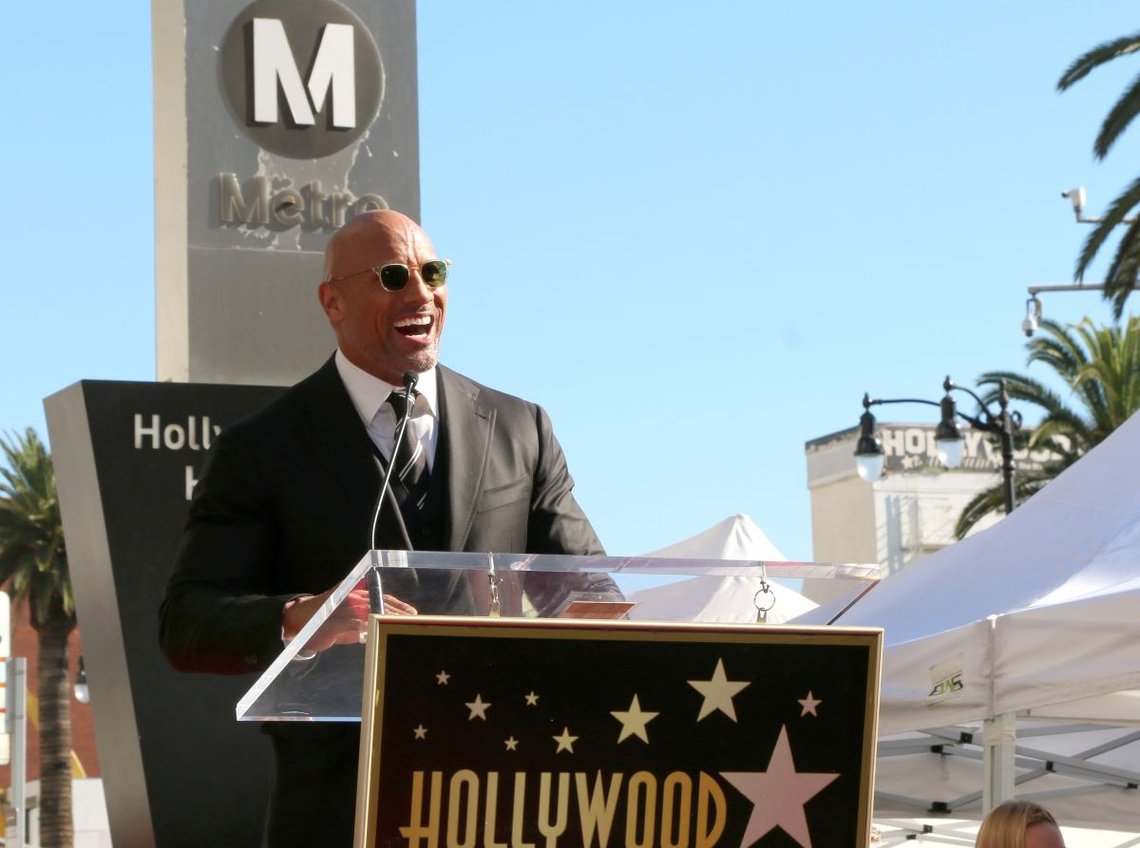 LOS ANGELES - DEC 13: Dwayne Johnson at the Dwayne Johnson Star Ceremony on the Hollywood Walk of Fame on December 13, 2017 in Los Angeles, CA. Photo: Shutterstock by Kathy Hutchins, United States. LOS ANGELES - DEC 13: Dwayne Johnson at the Dwayne Johnson Star Ceremony on the Hollywood Walk of Fame on December 13, 2017 in Los Angeles, CA. Photo: Shutterstock by Kathy Hutchins, United States.