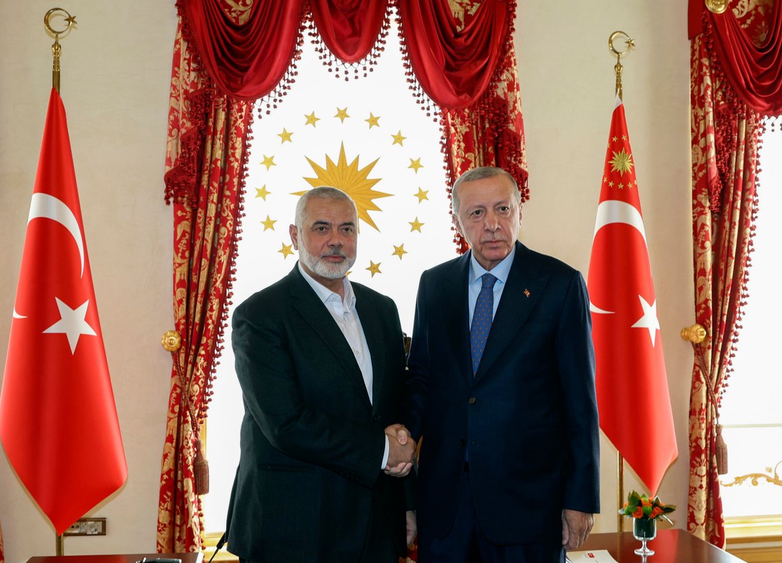 In this photo released by the Turkish Presidency, Turkey's President Recep Tayyip Erdogan, right, and Hamas leader Ismail Haniyeh, shake hands during their meeting in Istanbul, Turkey, Saturday, April 20, 2024. (Turkish Presidency via AP) In this photo released by the Turkish Presidency, Turkey's President Recep Tayyip Erdogan, right, and Hamas leader Ismail Haniyeh, shake hands during their meeting in Istanbul, Turkey, Saturday, April 20, 2024. (Turkish Presidency via AP)