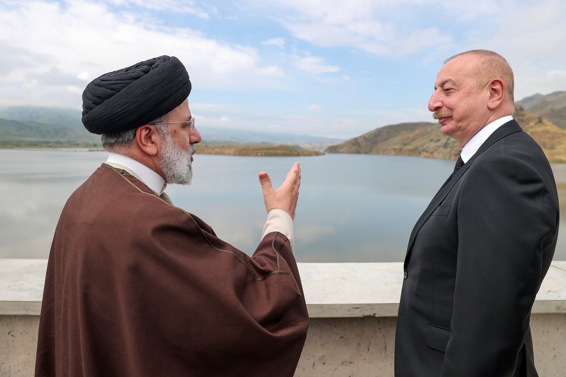 In this photo released by the Iranian Presidency Office, President Ebrahim Raisi, left, speaks with his Azeri counterpart Ilham Aliyev on the inauguration of dam of Qiz Qalasi, or Castel of Girl in Azeri, at the border of Iran and Azerbaijan, Sunday May 19, 2024. A helicopter carrying Iranian President Ebrahim Raisi suffered a "hard landing" on Sunday, Iranian state media reported, without immediately elaborating. (Iranian Presidency Office via AP) In this photo released by the Iranian Presidency Office, President Ebrahim Raisi, left, speaks with his Azeri counterpart Ilham Aliyev on the inauguration of dam of Qiz Qalasi, or Castel of Girl in Azeri, at the border of Iran and Azerbaijan, Sunday May 19, 2024. A helicopter carrying Iranian President Ebrahim Raisi suffered a "hard landing" on Sunday, Iranian state media reported, without immediately elaborating. (Iranian Presidency Office via AP)