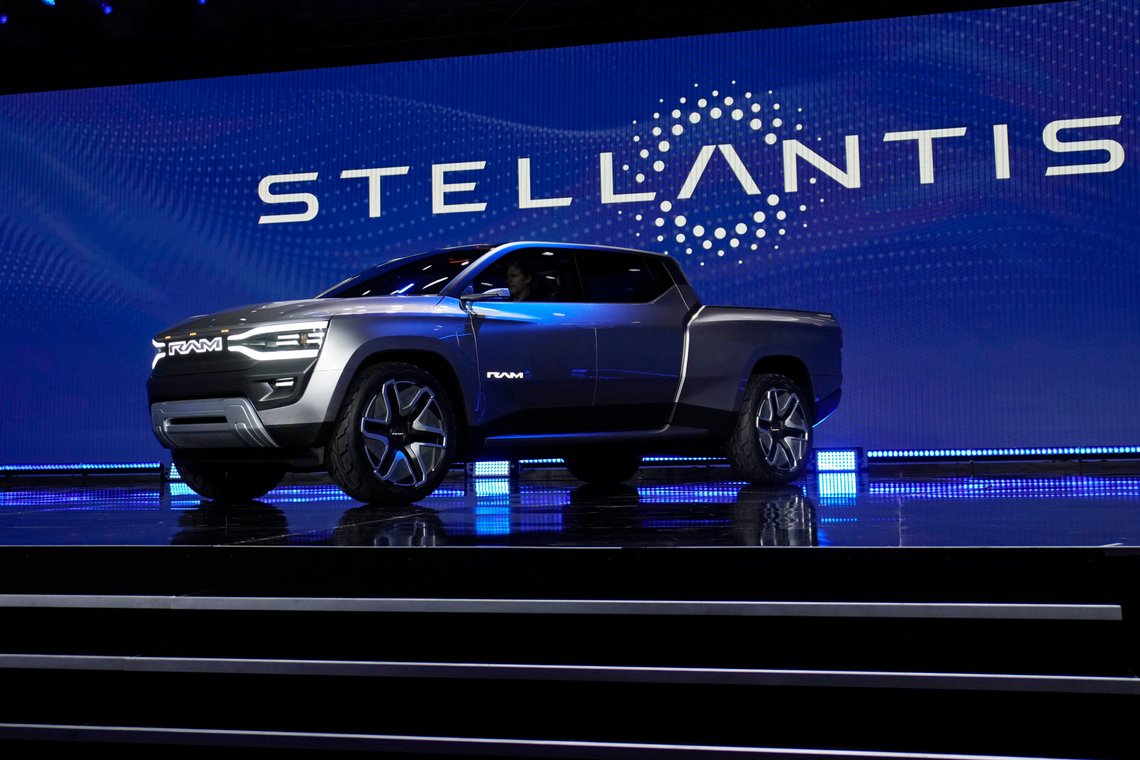 FILE - The Ram 1500 Revolution electric battery powered pickup truck is displayed on stage during the Stellantis keynote at the CES tech show on Jan. 5, 2023, in Las Vegas. Tensions rose in contract talks between the United Auto Workers union and Stellantis on Tuesday, Aug. 8, with the union president accusing the company of seeking concessions in contract talks when the union wants gains, as a September strike threat looms. (AP Photo/John Locher, File) FILE - The Ram 1500 Revolution electric battery powered pickup truck is displayed on stage during the Stellantis keynote at the CES tech show on Jan. 5, 2023, in Las Vegas. Tensions rose in contract talks between the United Auto Workers union and Stellantis on Tuesday, Aug. 8, with the union president accusing the company of seeking concessions in contract talks when the union wants gains, as a September strike threat looms. (AP Photo/John Locher, File)