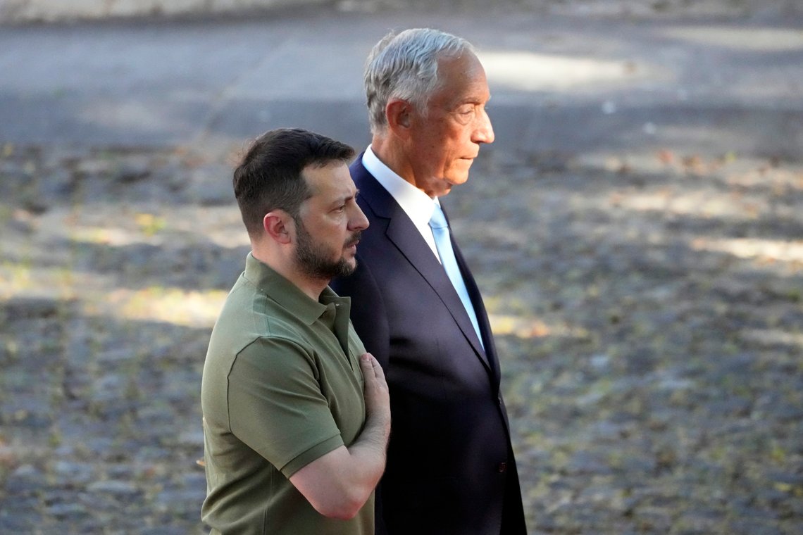 Ukrainian President Volodymyr Zelenskyy, left, and Portuguese President Marcelo Rebelo de Sousa listen to the Ukrainian national anthem during a welcome ceremony at the Belem presidential palace, in Lisbon, Tuesday, May 28, 2024. Zelenskyy is on a one day official visit to Portugal. (AP Photo/Armando Franca) Ukrainian President Volodymyr Zelenskyy, left, and Portuguese President Marcelo Rebelo de Sousa listen to the Ukrainian national anthem during a welcome ceremony at the Belem presidential palace, in Lisbon, Tuesday, May 28, 2024. Zelenskyy is on a one day official visit to Portugal. (AP Photo/Armando Franca)