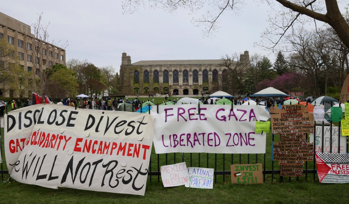 Signs are displayed outside a tent encampment at Northwestern University on Friday, April 26, 2024, in Evanston, Illinois. Students want the university to divest from funds connected to Israel or that profit from its war in Gaza. (AP Photo/Teresa Crawford) Signs are displayed outside a tent encampment at Northwestern University on Friday, April 26, 2024, in Evanston, Illinois. Students want the university to divest from funds connected to Israel or that profit from its war in Gaza. (AP Photo/Teresa Crawford)