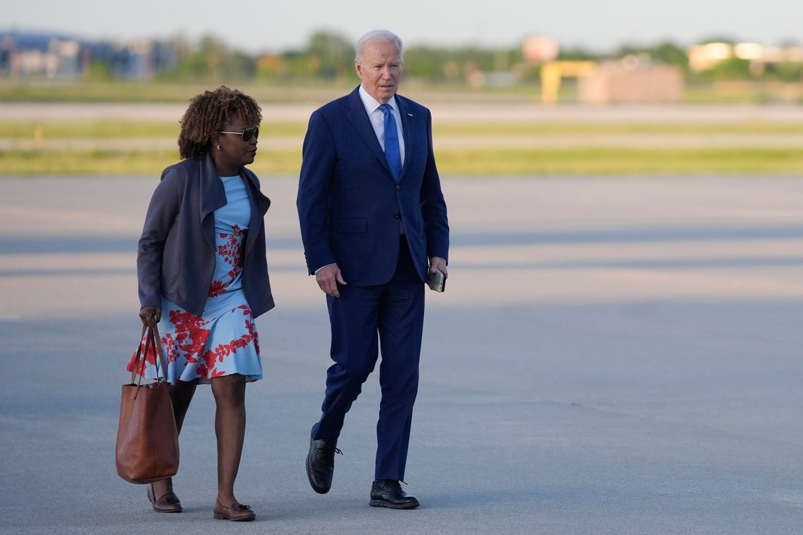 President Joe Biden walks with White House press secretary Karine Jean-Pierre to board Air Force One to return to Washington, Wednesday, May 8, 2024, in Chicago. (AP Photo/Evan Vucci) President Joe Biden walks with White House press secretary Karine Jean-Pierre to board Air Force One to return to Washington, Wednesday, May 8, 2024, in Chicago. (AP Photo/Evan Vucci)