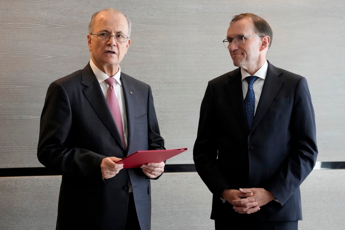 Prime Minister of the Palestinian Authority Mohammed Mustafa, left, speaks after receiving a document handed over by Norway's Foreign Minister Espen Barth Eide, right, prior to a meeting for talks on the Middle East in Brussels, Sunday, May 26, 2024. Norway on Sunday handed over papers to the Palestinian prime minister to officially give it diplomatic recognition as a state in a largely symbolic move that has infuriated Israel. The formal recognition by Norway, Spain and Ireland, which all have a record of friendly ties with both the Israelis and the Palestinians, while long advocating for a Palestinian state, is planned for Tuesday. (AP Photo/Virginia Mayo) Prime Minister of the Palestinian Authority Mohammed Mustafa, left, speaks after receiving a document handed over by Norway's Foreign Minister Espen Barth Eide, right, prior to a meeting for talks on the Middle East in Brussels, Sunday, May 26, 2024. Norway on Sunday handed over papers to the Palestinian prime minister to officially give it diplomatic recognition as a state in a largely symbolic move that has infuriated Israel. The formal recognition by Norway, Spain and Ireland, which all have a record of friendly ties with both the Israelis and the Palestinians, while long advocating for a Palestinian state, is planned for Tuesday. (AP Photo/Virginia Mayo)