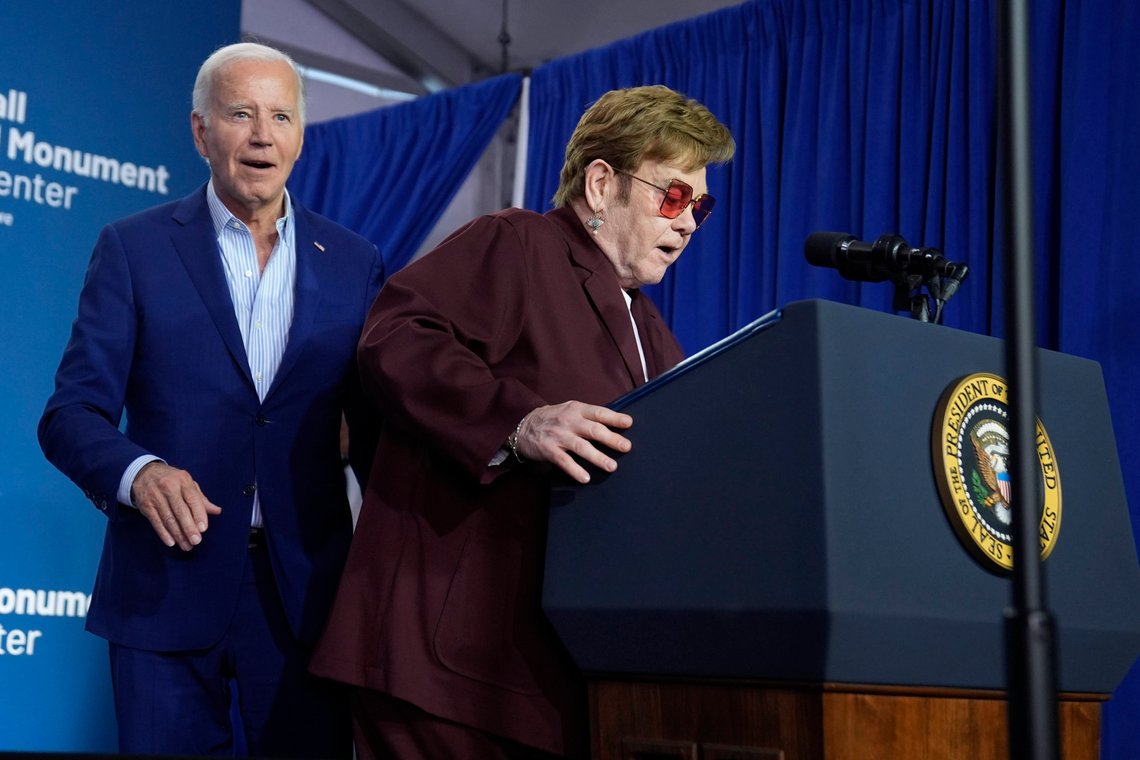 Elton John, right, prepares to speak as President Joe Biden looks on at the grand opening ceremony for the Stonewall National Monument Visitor Center, Friday, June 28, 2024, in New York. (AP Photo/Evan Vucci) Elton John, right, prepares to speak as President Joe Biden looks on at the grand opening ceremony for the Stonewall National Monument Visitor Center, Friday, June 28, 2024, in New York. (AP Photo/Evan Vucci)