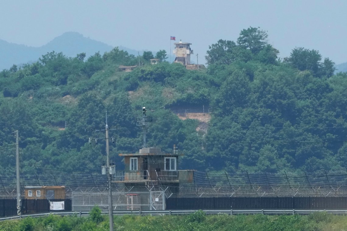 A North Korean military guard post, top, and a South Korean post, bottom, are seen from Paju, South Korea, near the border with North Korea, Tuesday, June 18, 2024. South Korean soldiers fired warning shots to repel North Korean soldiers who temporarily crossed the rivals' land border Tuesday for the second time this month, South Korea's military said. (AP Photo/Ahn Young-joon) A North Korean military guard post, top, and a South Korean post, bottom, are seen from Paju, South Korea, near the border with North Korea, Tuesday, June 18, 2024. South Korean soldiers fired warning shots to repel North Korean soldiers who temporarily crossed the rivals' land border Tuesday for the second time this month, South Korea's military said. (AP Photo/Ahn Young-joon)