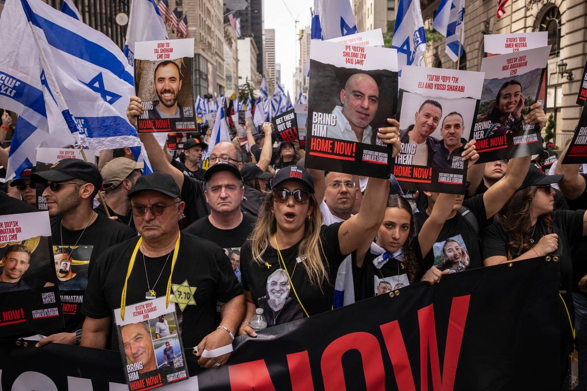Family members of Israeli hostages raise posters during the annual Israel Day Parade on Fifth Avenue on Sunday, June 2, 2024, in New York. (AP Photo/Yuki Iwamura) Family members of Israeli hostages raise posters during the annual Israel Day Parade on Fifth Avenue on Sunday, June 2, 2024, in New York. (AP Photo/Yuki Iwamura)