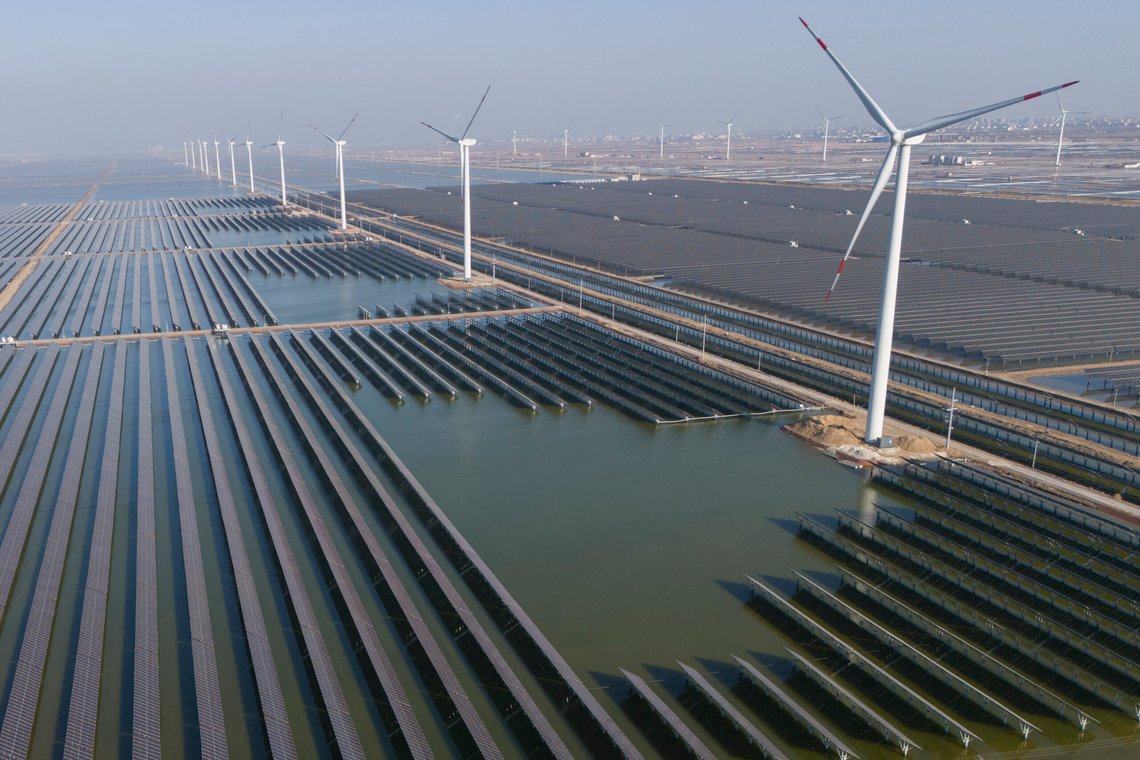 Wind turbines dot the coast line along a giant solar farm near Weifang in eastern China's Shandong province on March 22, 2024. China's Commerce Ministry has announced it will launch an investigation into whether unfair trade practices were adopted by the European Union in its probe of Chinese companies. It said Wednesday, July 10, 2024 the investigation will focus on wind power, photovoltaics, security equipment and others. (AP Photo/Ng Han Guan) Wind turbines dot the coast line along a giant solar farm near Weifang in eastern China's Shandong province on March 22, 2024. China's Commerce Ministry has announced it will launch an investigation into whether unfair trade practices were adopted by the European Union in its probe of Chinese companies. It said Wednesday, July 10, 2024 the investigation will focus on wind power, photovoltaics, security equipment and others. (AP Photo/Ng Han Guan)