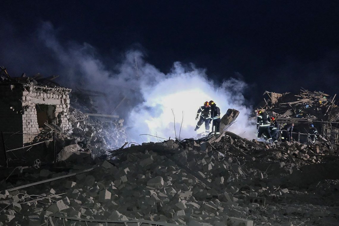In this photo provided by the Ukrainian Emergency Service, firefighters examine the site of Russia's missile attack that hit an apartment building in Pokrovsk, Ukraine, late Saturday, Jan. 6, 2024. (Ukrainian Emergency Service via AP) In this photo provided by the Ukrainian Emergency Service, firefighters examine the site of Russia's missile attack that hit an apartment building in Pokrovsk, Ukraine, late Saturday, Jan. 6, 2024. (Ukrainian Emergency Service via AP)