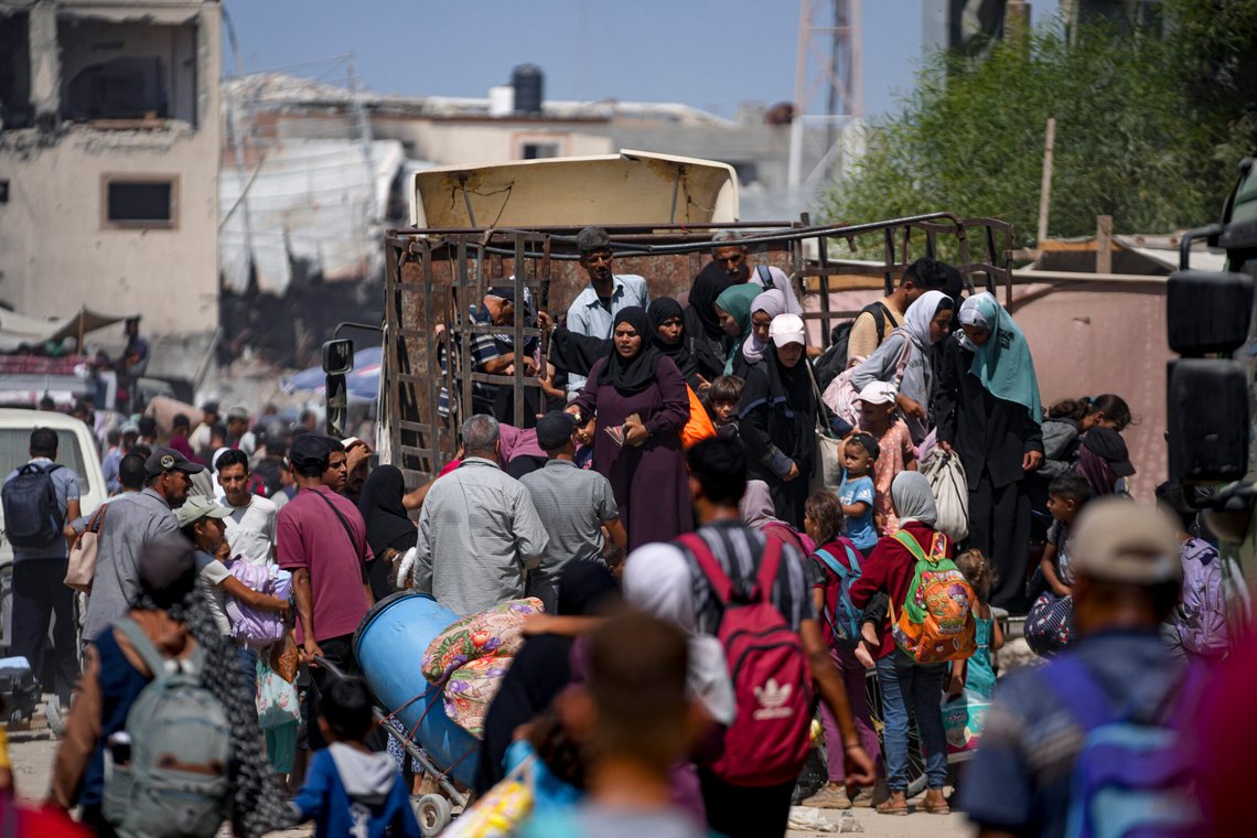 Palestinians displaced by the Israeli air and ground offensive on the Gaza Strip flee from parts of Khan Younis following an evacuation order by the Israeli army to leave the eastern part of Gaza Strip's second largest city, Monday, July 22, 2024. (AP Photo/Abdel Kareem Hana) Palestinians displaced by the Israeli air and ground offensive on the Gaza Strip flee from parts of Khan Younis following an evacuation order by the Israeli army to leave the eastern part of Gaza Strip's second largest city, Monday, July 22, 2024. (AP Photo/Abdel Kareem Hana)