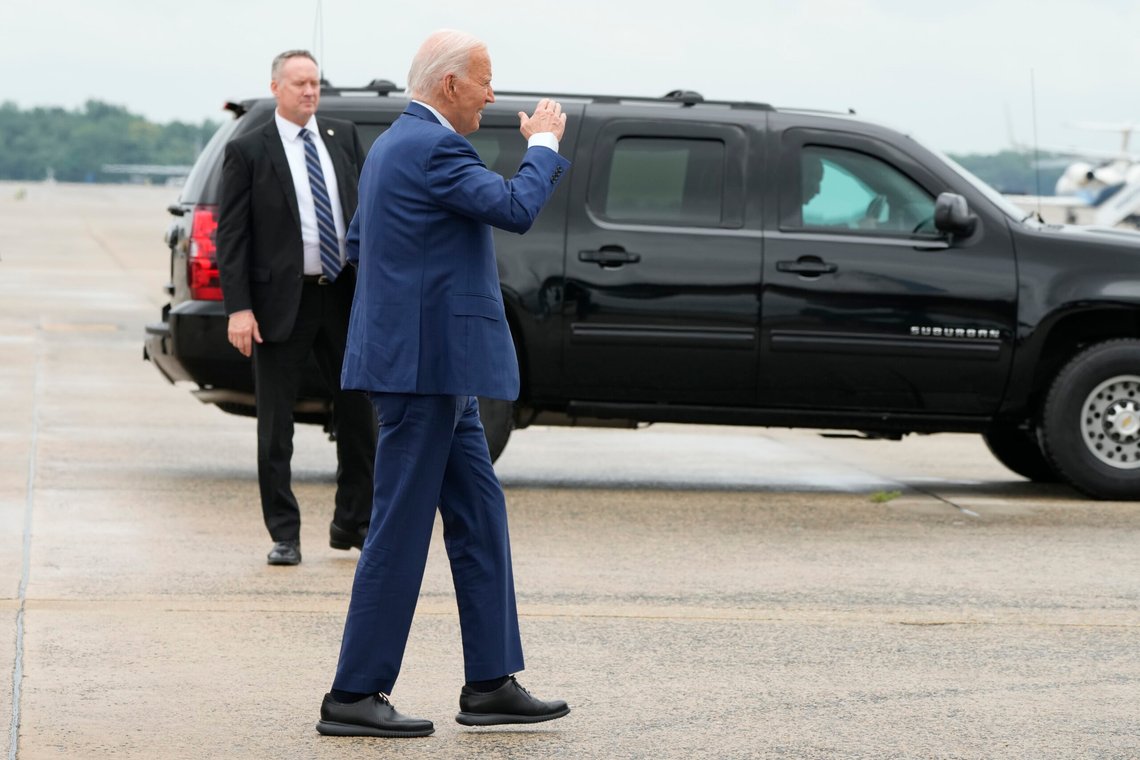 President Joe Biden salutes as he walks to board Air Force One at Andrews Air Force Base, Md., Friday July 12, 2024, en route to Detroit. (AP Photo/Jacquelyn Martin) President Joe Biden salutes as he walks to board Air Force One at Andrews Air Force Base, Md., Friday July 12, 2024, en route to Detroit. (AP Photo/Jacquelyn Martin)