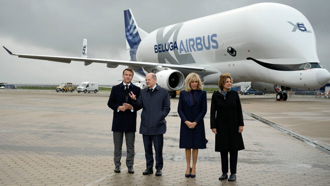 French President Emmanuel Macron, German Chancellor Olaf Scholz, Brigitte Macron and Chancellor's wife Britta Ernst, from left, stand in front of an Airbus Beluga transport aircraft at the Airbus site in Hamburg-Finkenwerder prior to a joint cabinet meeting of the German and French Government in Hamburg , Germany, Monday, Oct. 9, 2023. (AP Photo/Markus Schreiber) French President Emmanuel Macron, German Chancellor Olaf Scholz, Brigitte Macron and Chancellor's wife Britta Ernst, from left, stand in front of an Airbus Beluga transport aircraft at the Airbus site in Hamburg-Finkenwerder prior to a joint cabinet meeting of the German and French Government in Hamburg , Germany, Monday, Oct. 9, 2023. (AP Photo/Markus Schreiber)