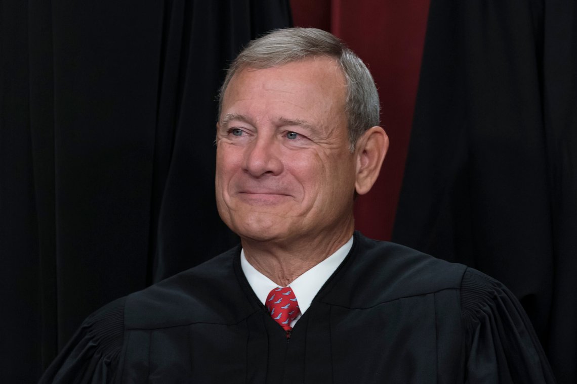 FILE - Chief Justice of the United States John Roberts joins other members of the Supreme Court as they pose for a new group portrait, at the Supreme Court building in Washington, Oct. 7, 2022. Roberts has declined an invitation to meet with Democratic senators to talk about Supreme Court ethics and the controversy over flags that flew outside homes owned by Justice Samuel Alito. (AP Photo/J. Scott Applewhite, File) FILE - Chief Justice of the United States John Roberts joins other members of the Supreme Court as they pose for a new group portrait, at the Supreme Court building in Washington, Oct. 7, 2022. Roberts has declined an invitation to meet with Democratic senators to talk about Supreme Court ethics and the controversy over flags that flew outside homes owned by Justice Samuel Alito. (AP Photo/J. Scott Applewhite, File)