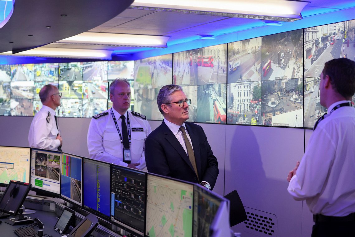 British Prime Minister Keir Starmer views CCTV screens with Metropolitan Police Commissioner Mark Rowley, Metropolitan Police Deputy Assistant Commissioner Andy Valentine and Commander Ben Russell as they visit the Engineering Suite in the Metropolitan Police Command and Control Special Operations Room at Lambeth Police Headquarters in London, Friday Aug. 9, 2024. (Toby Melville/Pool photo via AP) British Prime Minister Keir Starmer views CCTV screens with Metropolitan Police Commissioner Mark Rowley, Metropolitan Police Deputy Assistant Commissioner Andy Valentine and Commander Ben Russell as they visit the Engineering Suite in the Metropolitan Police Command and Control Special Operations Room at Lambeth Police Headquarters in London, Friday Aug. 9, 2024. (Toby Melville/Pool photo via AP)
