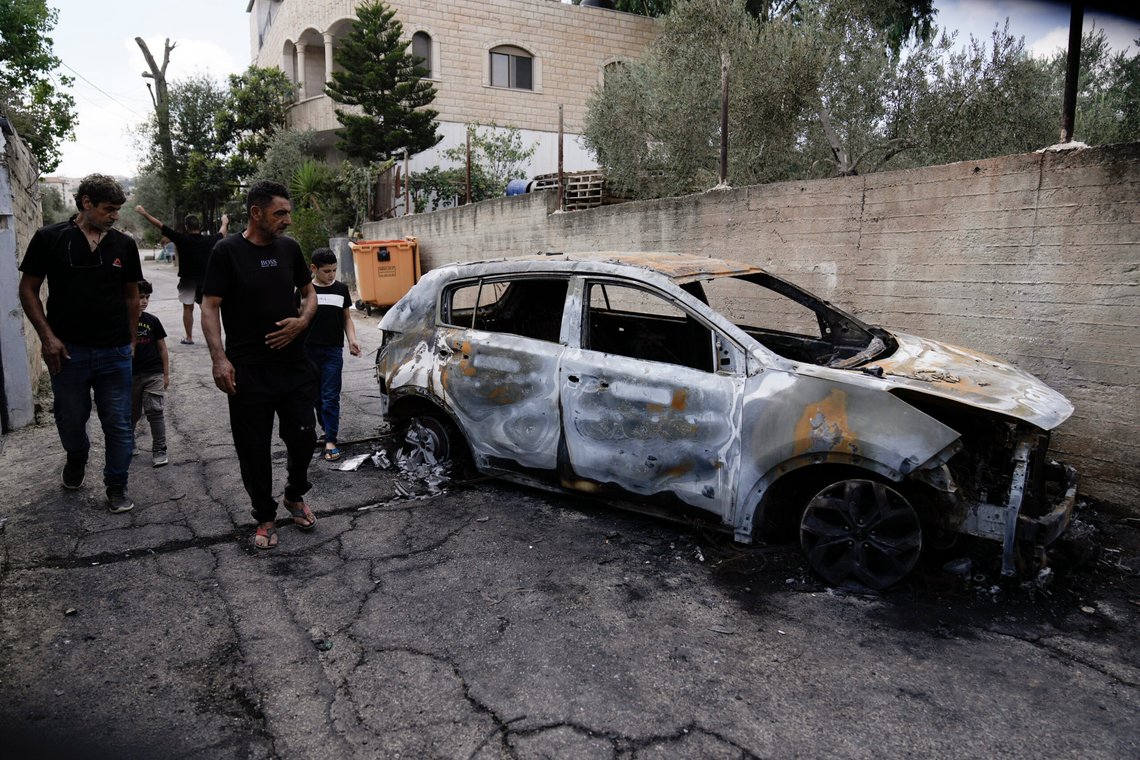 Palestinians check a damaged car following a military operation in the West Bank town of Zababdeh, south of Jenin, Friday, Aug. 30, 2024. (AP Photo/Majdi Mohammed) Palestinians check a damaged car following a military operation in the West Bank town of Zababdeh, south of Jenin, Friday, Aug. 30, 2024. (AP Photo/Majdi Mohammed)
