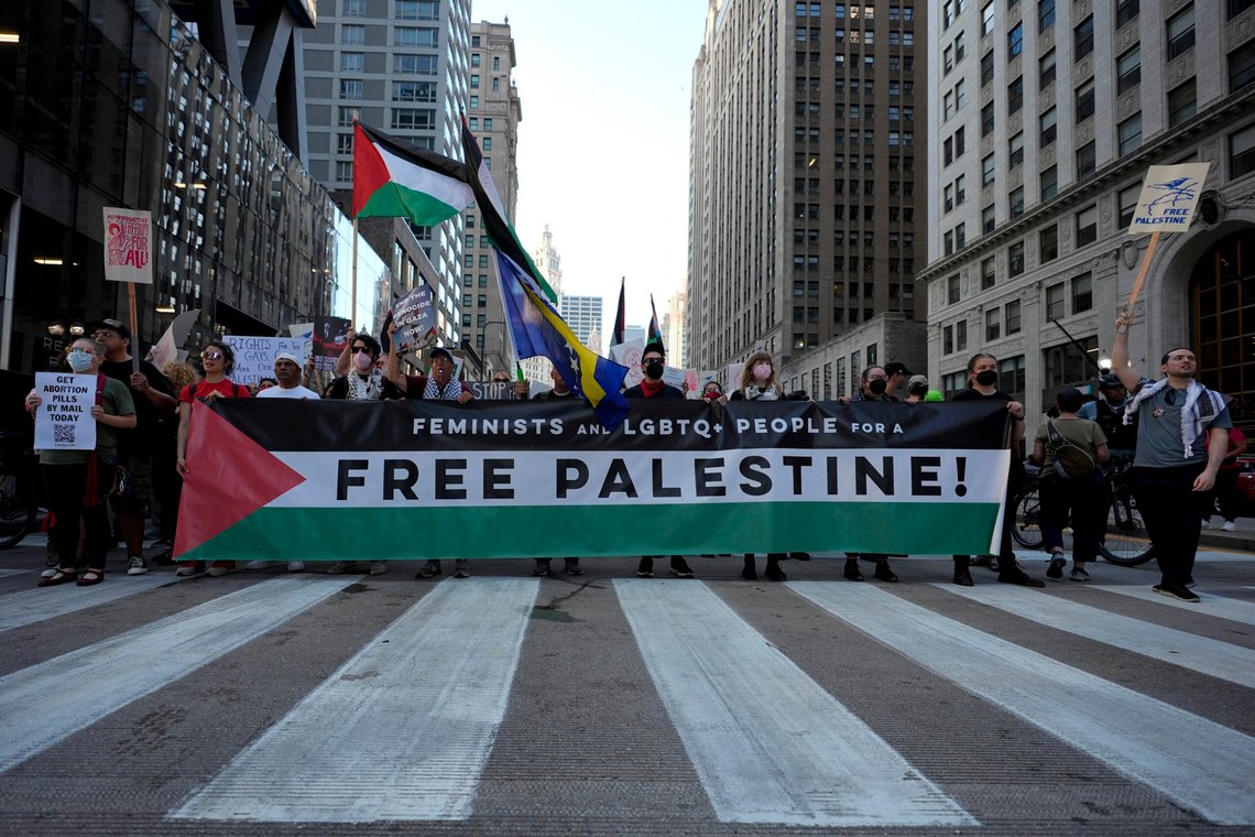 Protesters march prior to the start of the Democratic National Convention Sunday, Aug. 18, 2024, in Chicago. (AP Photo/Alex Brandon) Protesters march prior to the start of the Democratic National Convention Sunday, Aug. 18, 2024, in Chicago. (AP Photo/Alex Brandon)