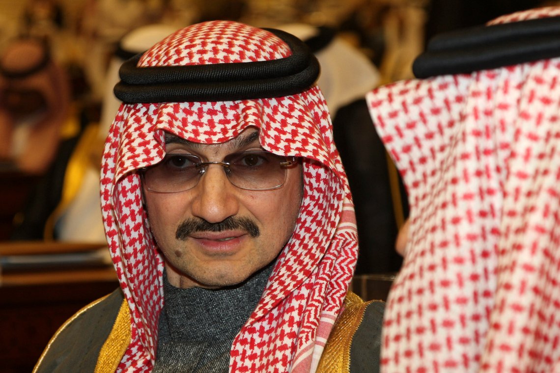 FILE- In this Sunday, March 7, 2010 file photo, Saudi billionaire Prince Alwaleed bin Talal al-Saud attends the speech of King Abdullah bin Abdul Aziz al-Saud of Saudi Arabia, at the Saudi Shura "consultative" council in Riyadh, Saudi Arabia. Saudi Arabia has arrested dozens of princes and former government ministers, including a well-known billionaire with extensive holdings in Western companies, as part of a sweeping anti-corruption probe, further cementing King Salman and his crown prince son's control of the kingdom. A high-level employee at Prince Alwaleed bin Talal's Kingdom Holding Company told The Associated Press that the royal was among those detained overnight Saturday, Nov. 4, 2017. (AP Photo/Hassan Ammar, File) FILE- In this Sunday, March 7, 2010 file photo, Saudi billionaire Prince Alwaleed bin Talal al-Saud attends the speech of King Abdullah bin Abdul Aziz al-Saud of Saudi Arabia, at the Saudi Shura "consultative" council in Riyadh, Saudi Arabia. Saudi Arabia has arrested dozens of princes and former government ministers, including a well-known billionaire with extensive holdings in Western companies, as part of a sweeping anti-corruption probe, further cementing King Salman and his crown prince son's control of the kingdom. A high-level employee at Prince Alwaleed bin Talal's Kingdom Holding Company told The Associated Press that the royal was among those detained overnight Saturday, Nov. 4, 2017. (AP Photo/Hassan Ammar, File)