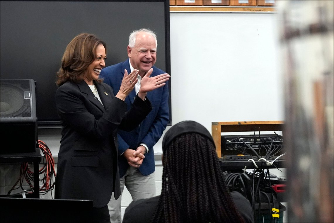 Democratic presidential nominee Vice President Kamala Harris and Democratic vice presidential candidate Minnesota Gov. Tim Walz speak to marching band members at Liberty County High School in Hinesville, Ga., Wednesday, Aug. 28, 2024. (AP Photo/Jacquelyn Martin) Democratic presidential nominee Vice President Kamala Harris and Democratic vice presidential candidate Minnesota Gov. Tim Walz speak to marching band members at Liberty County High School in Hinesville, Ga., Wednesday, Aug. 28, 2024. (AP Photo/Jacquelyn Martin)