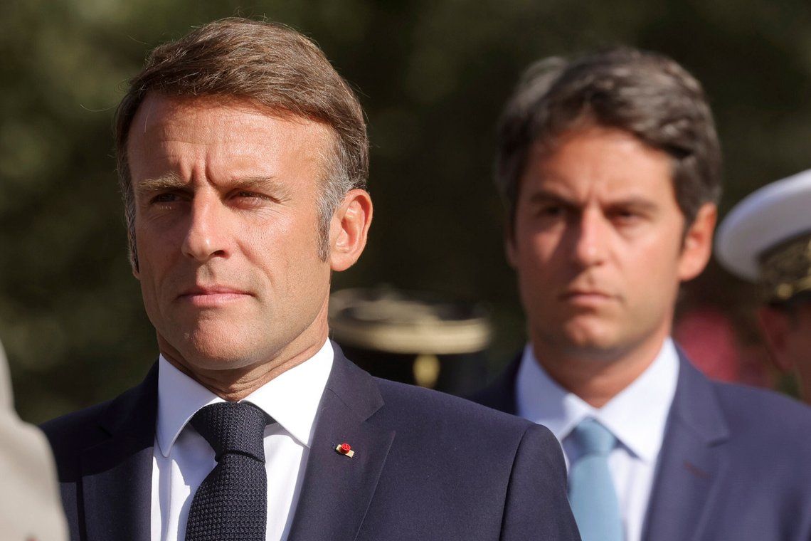 French President Emmanuel Macron, left, and French Prime Minister Gabriel Attal, right, attend a ceremony commemorating the 80th anniversary of the Liberation of Paris next to the Denfert Rochereau Square in Paris, France, Sunday, Aug. 25, 2024. (Teresa Suarez/ Pool photo via AP) French President Emmanuel Macron, left, and French Prime Minister Gabriel Attal, right, attend a ceremony commemorating the 80th anniversary of the Liberation of Paris next to the Denfert Rochereau Square in Paris, France, Sunday, Aug. 25, 2024. (Teresa Suarez/ Pool photo via AP)