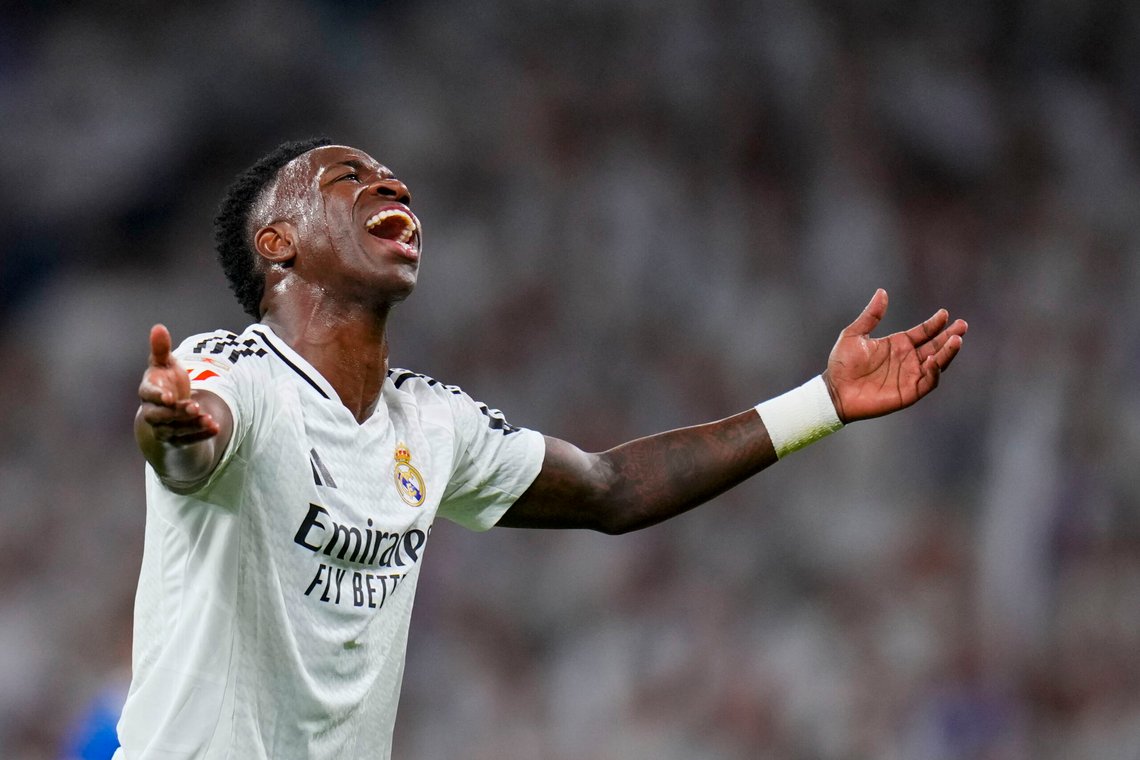 Real Madrid's Vinicius Junior reacts during a Spanish La Liga soccer match between Real Madrid and Alaves at Santiago Bernabeu stadium in Madrid, Spain, Tuesday, Sept. 24, 2024. (AP Photo/Manu Fernandez) Real Madrid's Vinicius Junior reacts during a Spanish La Liga soccer match between Real Madrid and Alaves at Santiago Bernabeu stadium in Madrid, Spain, Tuesday, Sept. 24, 2024. (AP Photo/Manu Fernandez)