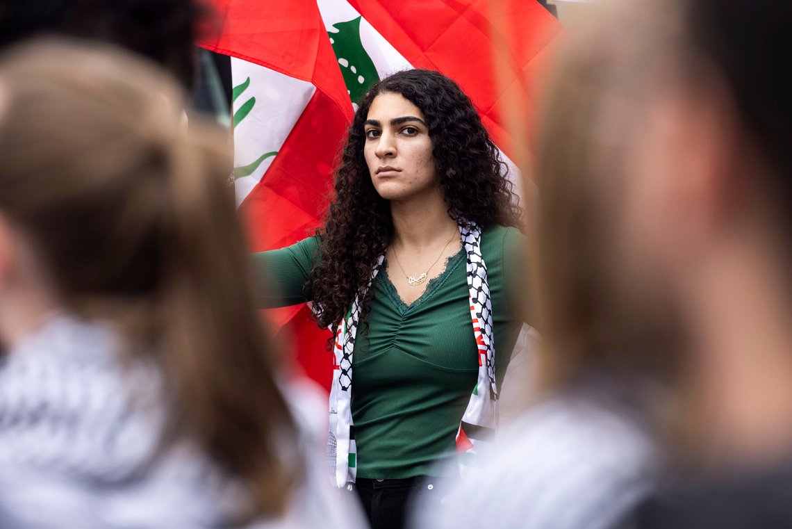 A protester waves a Lebanese flag as demonstrators gather against the war in Lebanon in front of the Los Angeles Federal Building on Tuesday, Sept. 24, 2024, in Los Angeles. (AP Photo/Etienne Laurent) A protester waves a Lebanese flag as demonstrators gather against the war in Lebanon in front of the Los Angeles Federal Building on Tuesday, Sept. 24, 2024, in Los Angeles. (AP Photo/Etienne Laurent)