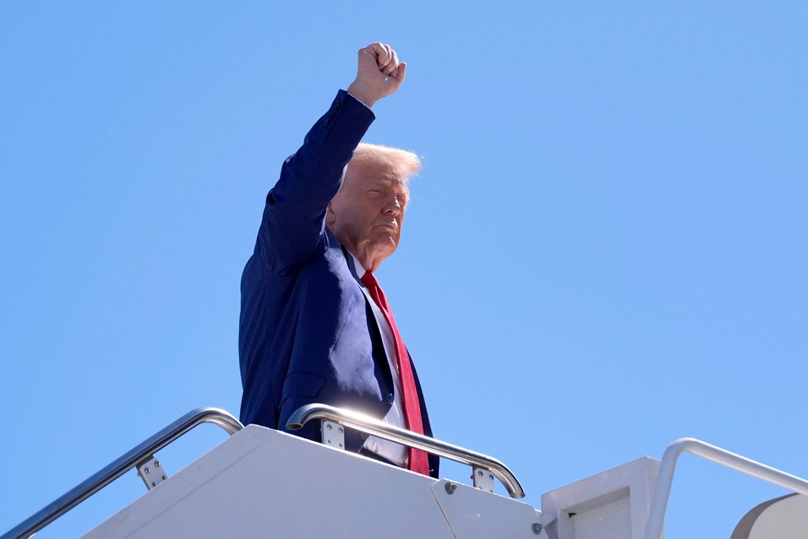 Republican presidential nominee former President Donald Trump gestures as he boards a plane at Harry Reid International Airport after a campaign trip, Saturday, Sept.14, 2024, in Las Vegas. (AP Photo/Alex Brandon) Republican presidential nominee former President Donald Trump gestures as he boards a plane at Harry Reid International Airport after a campaign trip, Saturday, Sept.14, 2024, in Las Vegas. (AP Photo/Alex Brandon)