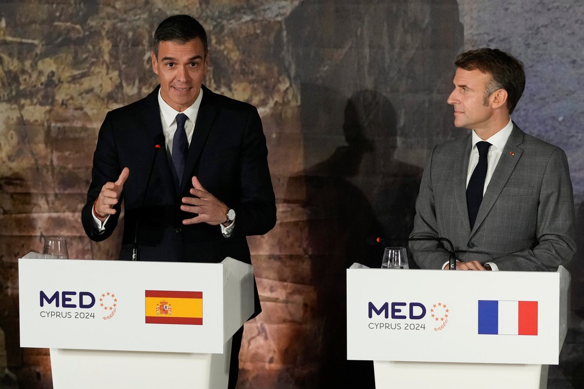 Spain's Prime minister Pedro Sanchez, left, speaks next to French President Emmanuel Macron during a news conference in Paphos ,Cyprus, on Friday, Oct 11, 2024 as the leaders of nine southern European Union member countries and Jordan are meeting to come up with ways of de-escalating the conflict in the Middle East (AP Photo/Petros Karadjias) Spain's Prime minister Pedro Sanchez, left, speaks next to French President Emmanuel Macron during a news conference in Paphos ,Cyprus, on Friday, Oct 11, 2024 as the leaders of nine southern European Union member countries and Jordan are meeting to come up with ways of de-escalating the conflict in the Middle East (AP Photo/Petros Karadjias)