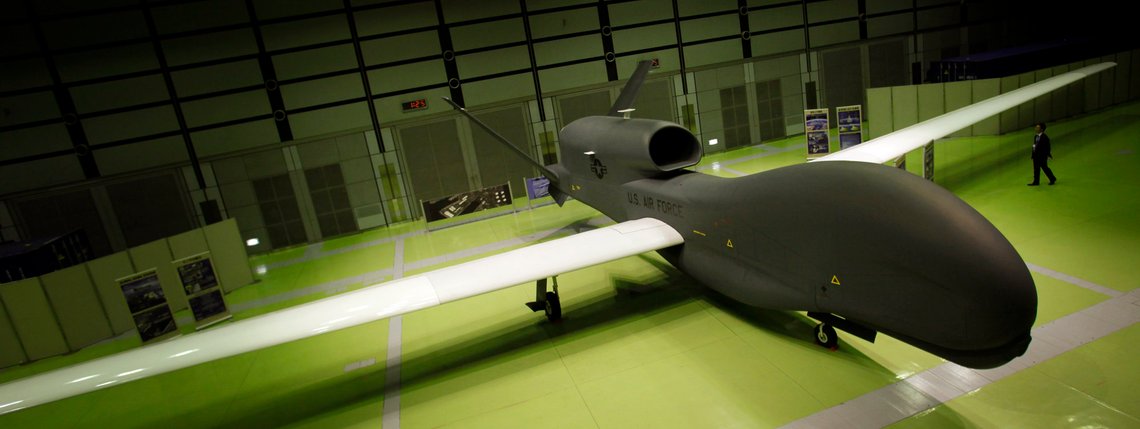 A mockup of Northrop Grumman's Unmanned Aerial Reconnaissance System plane RQ-4 Global Hawk is on display during a press briefing of the plane at a public exhibition hall in Tokyo, Wednesday, March 24, 2010. The Global Hawk can fly at altitudes of more than 60,000 feet for more than 32 hours and send near real-time reconnaissance imagery and signals intelligence data to forces in the air, on the ground and at sea. (AP Photo/Junji Kurokawa) A mockup of Northrop Grumman's Unmanned Aerial Reconnaissance System plane RQ-4 Global Hawk is on display during a press briefing of the plane at a public exhibition hall in Tokyo, Wednesday, March 24, 2010. The Global Hawk can fly at altitudes of more than 60,000 feet for more than 32 hours and send near real-time reconnaissance imagery and signals intelligence data to forces in the air, on the ground and at sea. (AP Photo/Junji Kurokawa)