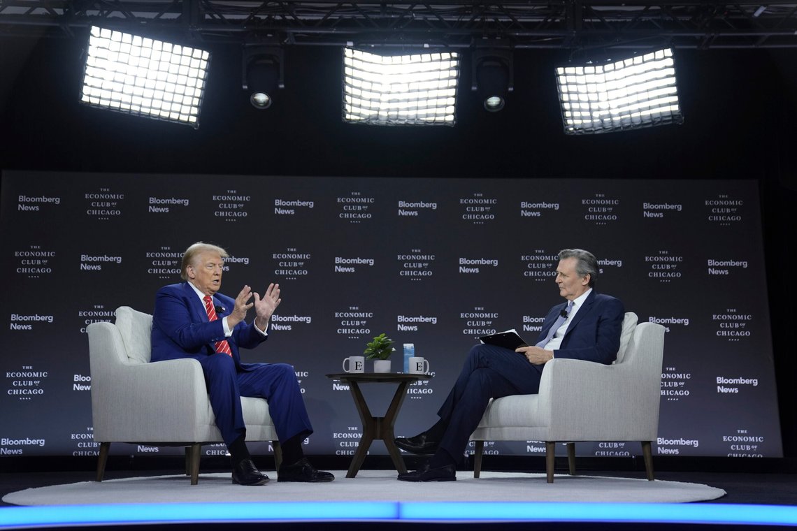 Republican presidential nominee former President Donald Trump speaks during an interview with Bloomberg News Editor-in-Chief John Micklethwait during an event with the Economic Club of Chicago, Tuesday, Oct. 15, 2024, in Chicago. (AP Photo/Evan Vucci) Republican presidential nominee former President Donald Trump speaks during an interview with Bloomberg News Editor-in-Chief John Micklethwait during an event with the Economic Club of Chicago, Tuesday, Oct. 15, 2024, in Chicago. (AP Photo/Evan Vucci)
