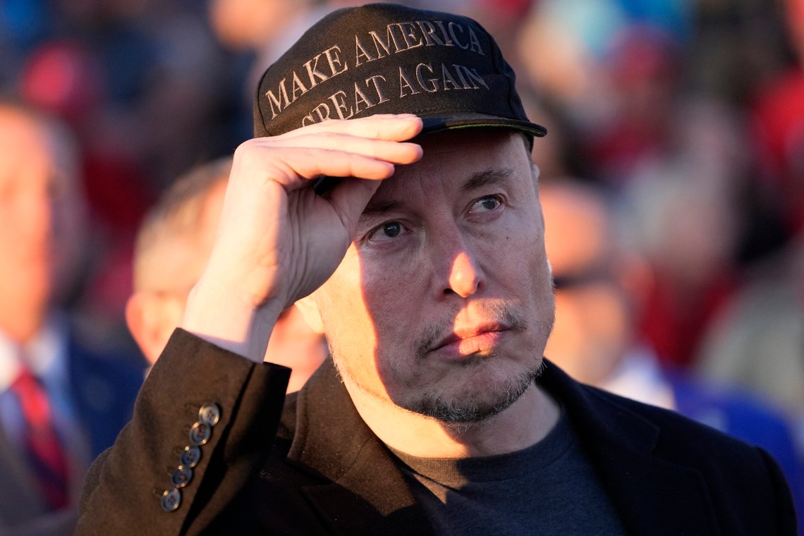 Tesla and SpaceX CEO Elon Musk listens as Republican presidential nominee former President Donald Trump speaks at a campaign event at the Butler Farm Show, Saturday, Oct. 5, 2024, in Butler, Pa. (AP Photo/Alex Brandon) Tesla and SpaceX CEO Elon Musk listens as Republican presidential nominee former President Donald Trump speaks at a campaign event at the Butler Farm Show, Saturday, Oct. 5, 2024, in Butler, Pa. (AP Photo/Alex Brandon)