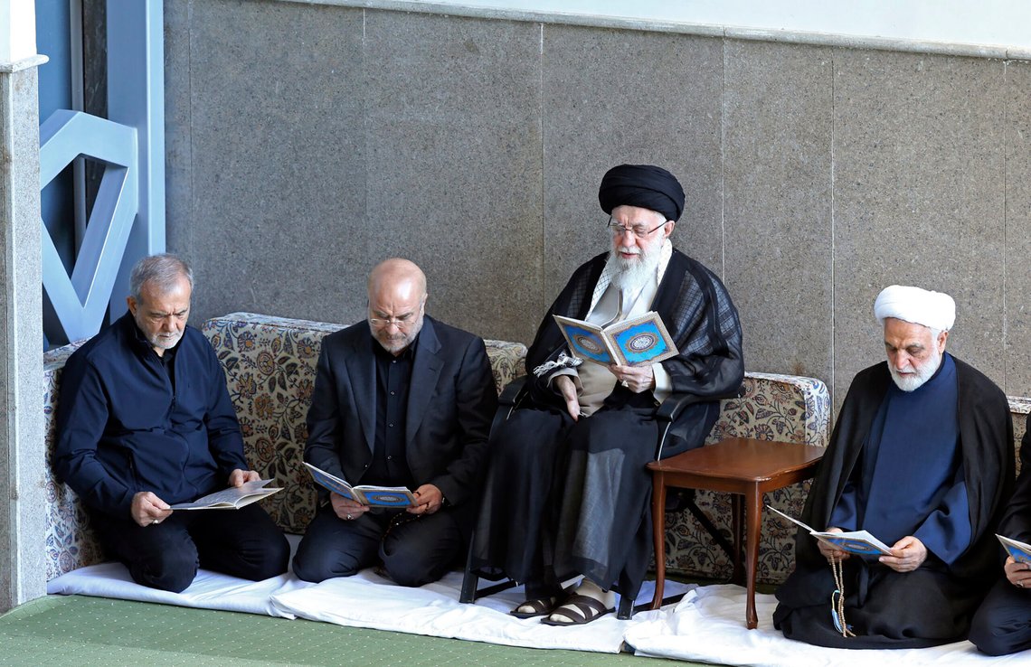In this photo released by the official website of the office of the Iranian supreme leader, Supreme Leader Ayatollah Ali Khamenei, second right, Judiciary Chief Gholam Hossein Mohseni Ejehei, right, Parliament Speaker Mohammad Bagher Qalibaf, second left, and President Masoud Pezeshkian read Quran in a ceremony commemorating slain Hezbollah leader Hassan Nasrallah, at Imam Khomeini grand mosque in Tehran, Iran, Friday, Oct. 4, 2024. (Office of the Iranian Supreme Leader via AP) In this photo released by the official website of the office of the Iranian supreme leader, Supreme Leader Ayatollah Ali Khamenei, second right, Judiciary Chief Gholam Hossein Mohseni Ejehei, right, Parliament Speaker Mohammad Bagher Qalibaf, second left, and President Masoud Pezeshkian read Quran in a ceremony commemorating slain Hezbollah leader Hassan Nasrallah, at Imam Khomeini grand mosque in Tehran, Iran, Friday, Oct. 4, 2024. (Office of the Iranian Supreme Leader via AP)