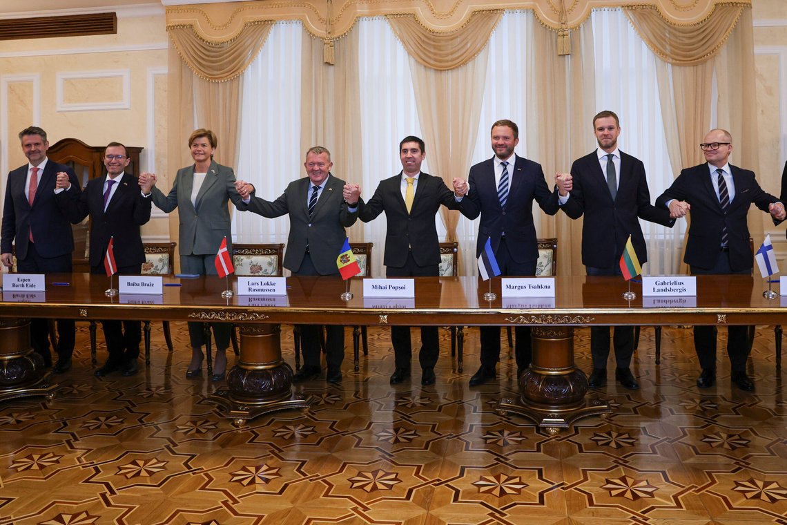 From left to right: Iceland's Secretary of State in the Foreign Ministry Martin Eyjolfsson, Norway's Foreign Minister Espen Barth Eide, Latvia's Foreign Minister Baiba Braze, Denmark's Foreign Minister Lars Lokke Rasmussen, Moldova's Foreign Minister, Mihai Popsoi, Estonia's Foreign Minister Margus Tsahkna, Lithuania's Foreign Minister Gabrielius Landsbergis, Finland's Secretary of State in the Foreign Ministry Pasi Rajala, hold hands as they pose after signing a document during a meeting of foreign ministers and state secretaries from the Nordic-Baltic Eight, in Chisinau Moldova, Tuesday, Oct.15, 2024. (AP Photo/Aurel Obreja) From left to right: Iceland's Secretary of State in the Foreign Ministry Martin Eyjolfsson, Norway's Foreign Minister Espen Barth Eide, Latvia's Foreign Minister Baiba Braze, Denmark's Foreign Minister Lars Lokke Rasmussen, Moldova's Foreign Minister, Mihai Popsoi, Estonia's Foreign Minister Margus Tsahkna, Lithuania's Foreign Minister Gabrielius Landsbergis, Finland's Secretary of State in the Foreign Ministry Pasi Rajala, hold hands as they pose after signing a document during a meeting of foreign ministers and state secretaries from the Nordic-Baltic Eight, in Chisinau Moldova, Tuesday, Oct.15, 2024. (AP Photo/Aurel Obreja)