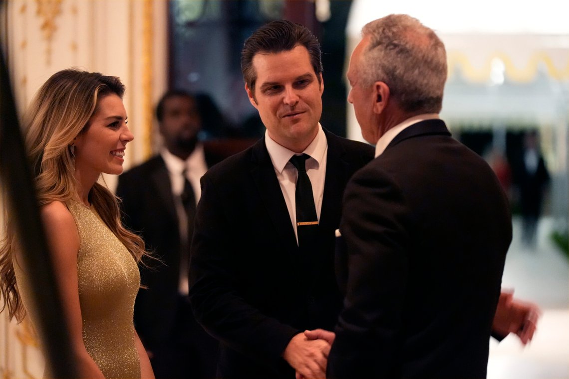 Robert F. Kennedy Jr., right, talks with Matt Gaetz and Ginger Luckey Gaetz before President-elect Donald Trump speaks during an America First Policy Institute gala at his Mar-a-Lago estate, Thursday, Nov. 14, 2024, in Palm Beach, Fla. (AP Photo/Alex Brandon) Robert F. Kennedy Jr., right, talks with Matt Gaetz and Ginger Luckey Gaetz before President-elect Donald Trump speaks during an America First Policy Institute gala at his Mar-a-Lago estate, Thursday, Nov. 14, 2024, in Palm Beach, Fla. (AP Photo/Alex Brandon)