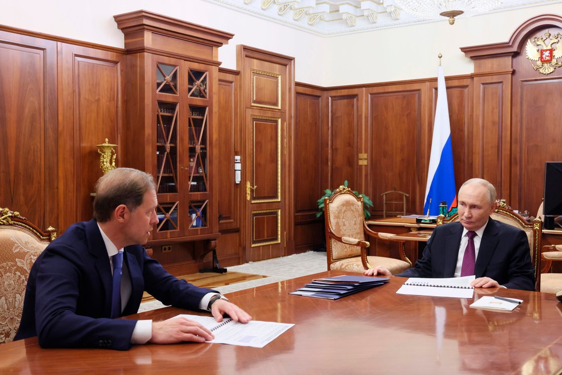 Russian President Vladimir Putin, right, meets with First Deputy Prime Minister Denis Manturov at the Kremlin, in Moscow, Russia, Wednesday, Nov. 20, 2024. (Vyacheslav Prokofyev, Sputnik, Kremlin Pool Photo via AP) Russian President Vladimir Putin, right, meets with First Deputy Prime Minister Denis Manturov at the Kremlin, in Moscow, Russia, Wednesday, Nov. 20, 2024. (Vyacheslav Prokofyev, Sputnik, Kremlin Pool Photo via AP)