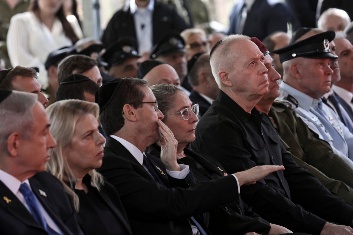 From left, Israel's Prime Minister Benjamin Netanyahu, his wife Sara Netanyahu, President Isaac Herzog, First Lady Michal Herzog, Defense Minister Yoav Gallant, Chief of the General Staff Lieutenant-General Herzi Halevi and interim Police Chief Avshalom Peled, attend a ceremony marking the Hebrew calendar anniversary of the Hamas attack on October 7 last year, at the Mount Herzl military cemetery in Jerusalem, Israel Sunday Oct. 27, 2024. (Gil Cohen-Magen/Pool Photo via AP) From left, Israel's Prime Minister Benjamin Netanyahu, his wife Sara Netanyahu, President Isaac Herzog, First Lady Michal Herzog, Defense Minister Yoav Gallant, Chief of the General Staff Lieutenant-General Herzi Halevi and interim Police Chief Avshalom Peled, attend a ceremony marking the Hebrew calendar anniversary of the Hamas attack on October 7 last year, at the Mount Herzl military cemetery in Jerusalem, Israel Sunday Oct. 27, 2024. (Gil Cohen-Magen/Pool Photo via AP)