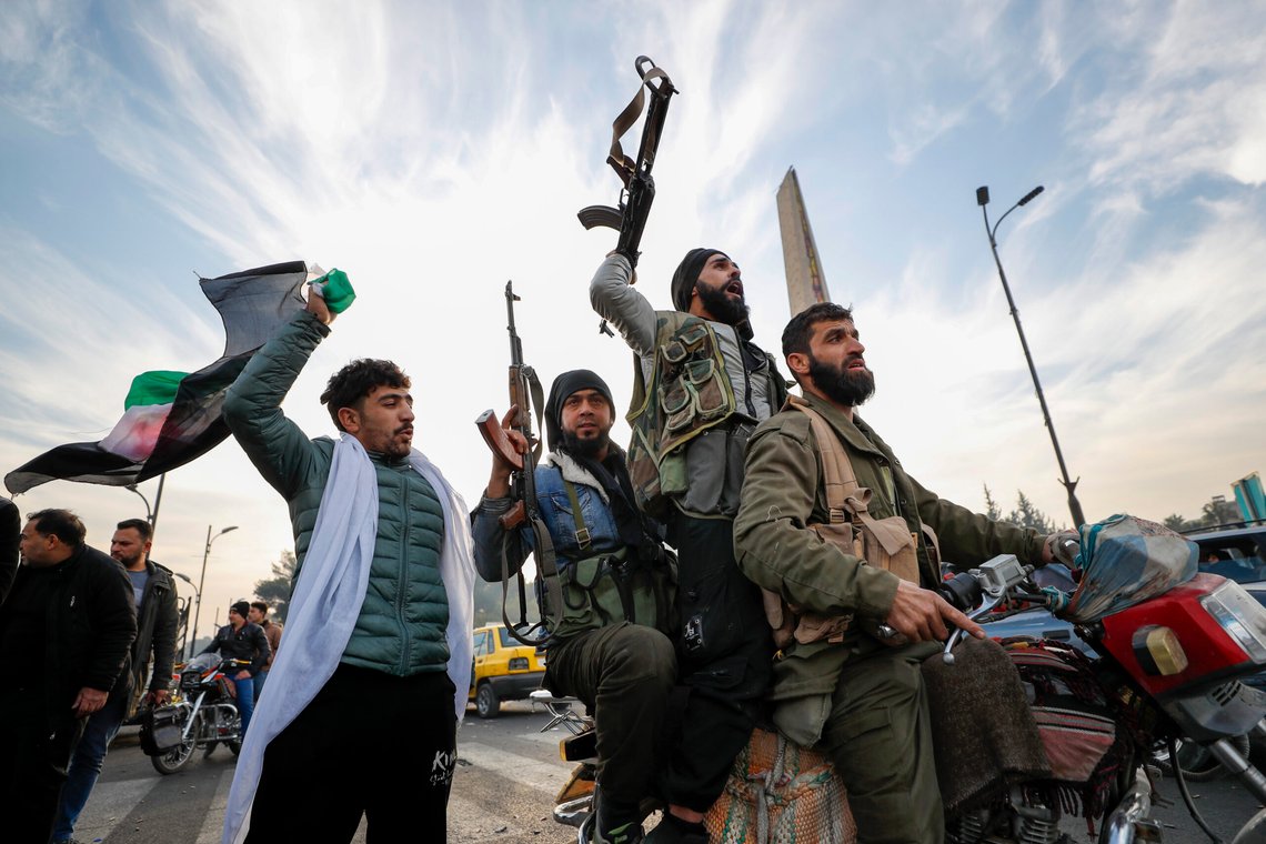 Syrian opposition fighters celebrate after the Syrian government collapsed in Damascus, Syria, Dec. 8, 2024. (AP Photo/Omar Sanadiki) Syrian opposition fighters celebrate after the Syrian government collapsed in Damascus, Syria, Dec. 8, 2024. (AP Photo/Omar Sanadiki)