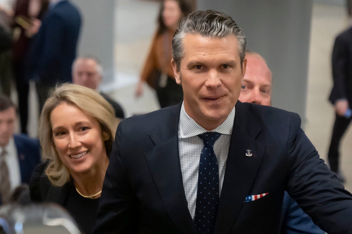 Pete Hegseth, President-elect Donald Trump's nominee to be defense secretary, is joined by his wife Jennifer Rauchet, as they walk through the basement of the Capitol, Wednesday, Dec. 4, 2024, in Washington. (AP Photo/Mark Schiefelbein) Pete Hegseth, President-elect Donald Trump's nominee to be defense secretary, is joined by his wife Jennifer Rauchet, as they walk through the basement of the Capitol, Wednesday, Dec. 4, 2024, in Washington. (AP Photo/Mark Schiefelbein)