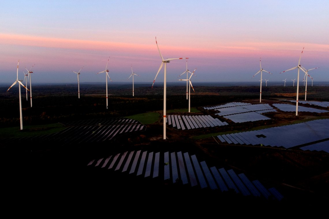 Wind turbines operate as the sun rises at the Klettwitz Nord solar energy park near Klettwitz, Germany, Wednesday, Oct. 16, 2024. (AP Photo/Matthias Schrader) Wind turbines operate as the sun rises at the Klettwitz Nord solar energy park near Klettwitz, Germany, Wednesday, Oct. 16, 2024. (AP Photo/Matthias Schrader)