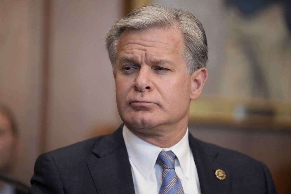 FBI Director Christopher Wray listens during a meeting of the Justice Department's Election Threats Task Force at the Department of Justice, Wednesday, Sept. 4, 2024, in Washington. (AP Photo/Mark Schiefelbein) FBI Director Christopher Wray listens during a meeting of the Justice Department's Election Threats Task Force at the Department of Justice, Wednesday, Sept. 4, 2024, in Washington. (AP Photo/Mark Schiefelbein)