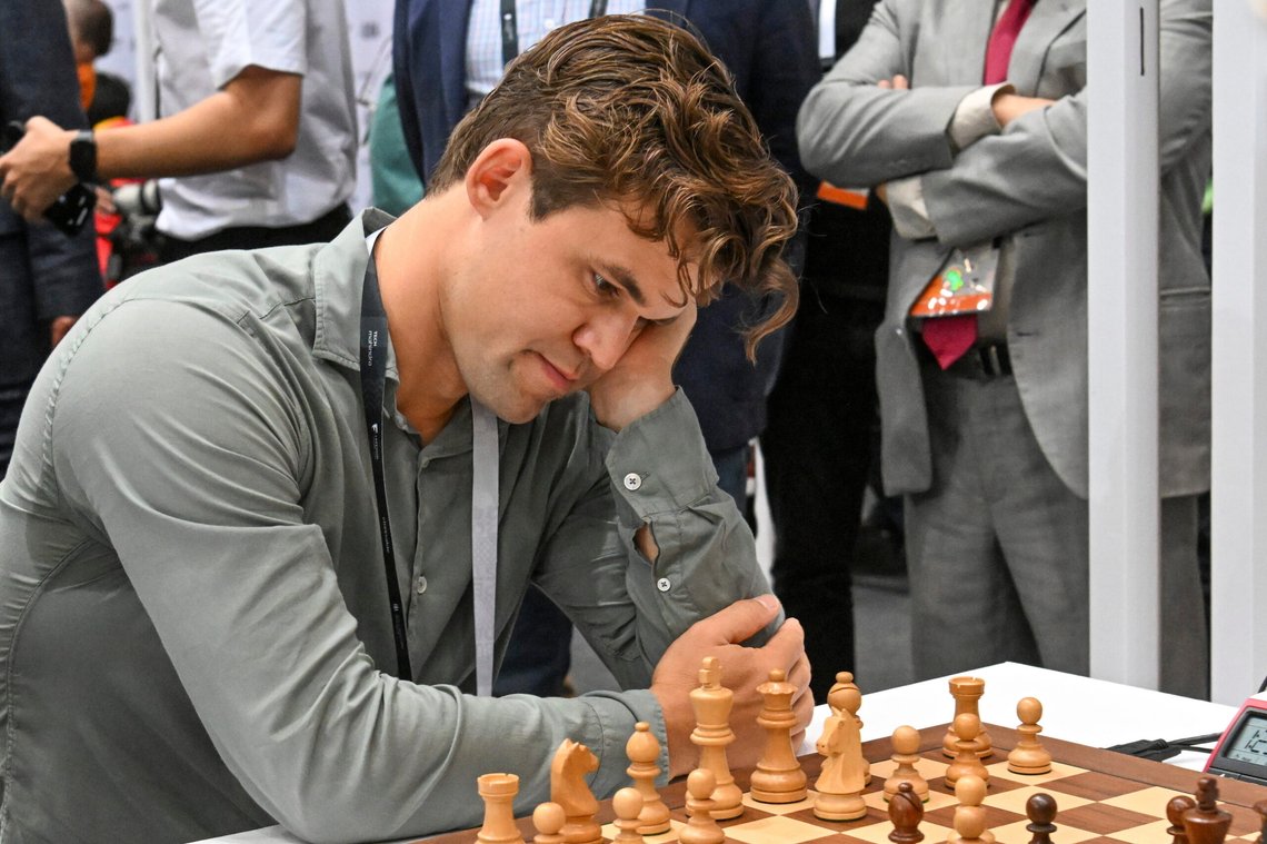 Magnus Carlsen of Norway plays against Parham Maghsoodloo of Iran, not pictured, during the Norway vs. Iran match in the 6th round of the 45th Chess Olympiad in Budapest, Hungary, Monday, Sept. 16, 2024. (Tibor Illyes/MTI via AP) Magnus Carlsen of Norway plays against Parham Maghsoodloo of Iran, not pictured, during the Norway vs. Iran match in the 6th round of the 45th Chess Olympiad in Budapest, Hungary, Monday, Sept. 16, 2024. (Tibor Illyes/MTI via AP)