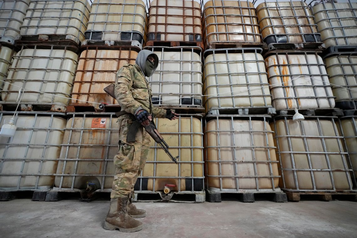 A Syrian member of the rebel group shows liquid material for manufacturing amphetamine pills known as Captagon hidden, at the warehouse where the drug was manufactured before the fall of Bashar Assad government at a facility in Douma city, outskirts of Damascus, Syria, Friday, Dec. 13, 2024. (AP Photo/Hussein Malla) A Syrian member of the rebel group shows liquid material for manufacturing amphetamine pills known as Captagon hidden, at the warehouse where the drug was manufactured before the fall of Bashar Assad government at a facility in Douma city, outskirts of Damascus, Syria, Friday, Dec. 13, 2024. (AP Photo/Hussein Malla)