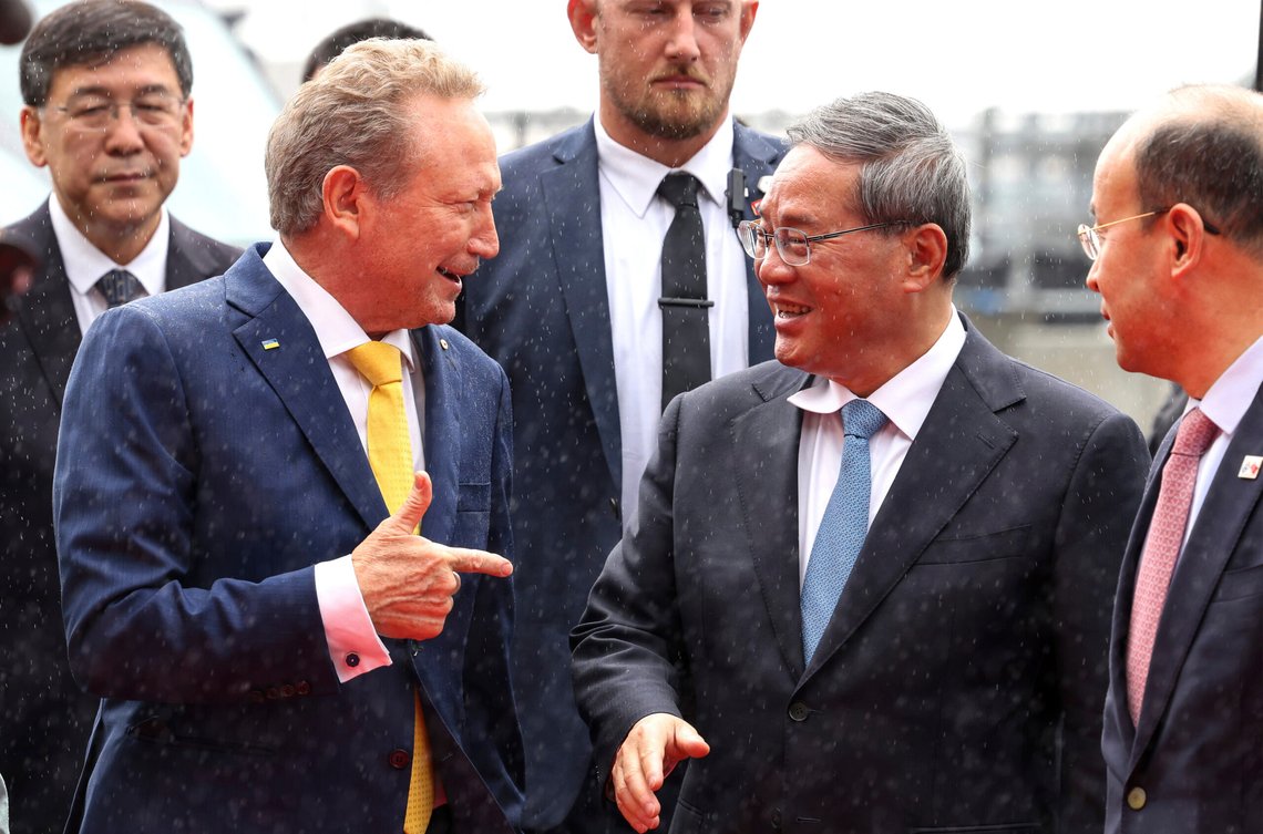 China's Premier Li Qiang, second right, speaks with Executive Chairman of Fortescue, Andrew Forrest, front left, during a visit to Fortescue Hazelmere research and development facility in Perth, Australia, Tuesday, June 18, 2024. Li is on a four-day visit to Australia. (Colin Murty/Pool Photo via AP) China's Premier Li Qiang, second right, speaks with Executive Chairman of Fortescue, Andrew Forrest, front left, during a visit to Fortescue Hazelmere research and development facility in Perth, Australia, Tuesday, June 18, 2024. Li is on a four-day visit to Australia. (Colin Murty/Pool Photo via AP)