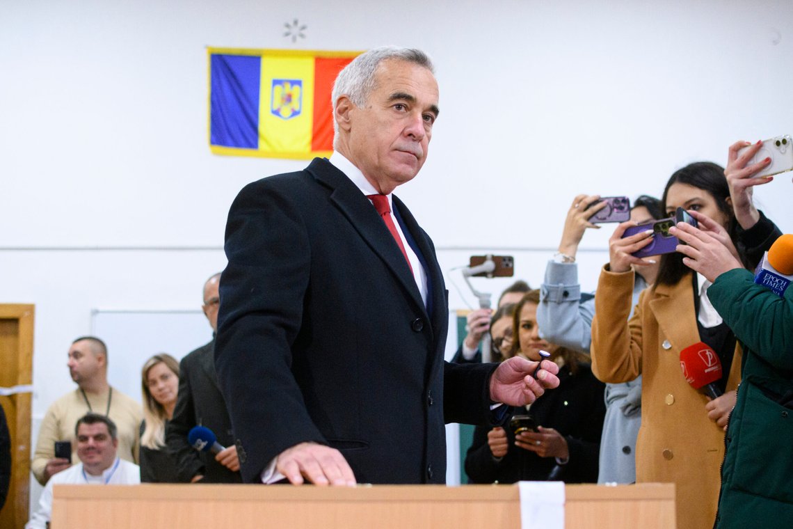 Calin Georgescu, an independent candidate for president who came first after the first round of presidential elections, casts his vote in the country's parliamentary elections, in Mogosoaia, Romania, Sunday, Dec. 1, 2024. (AP Photo/Alexandru Dobre) Calin Georgescu, an independent candidate for president who came first after the first round of presidential elections, casts his vote in the country's parliamentary elections, in Mogosoaia, Romania, Sunday, Dec. 1, 2024. (AP Photo/Alexandru Dobre)